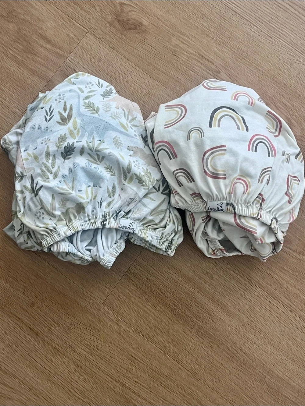 Bundle of TWO Copper Pearl Premium Crib sheets - Neutral Rainbow & Rex
